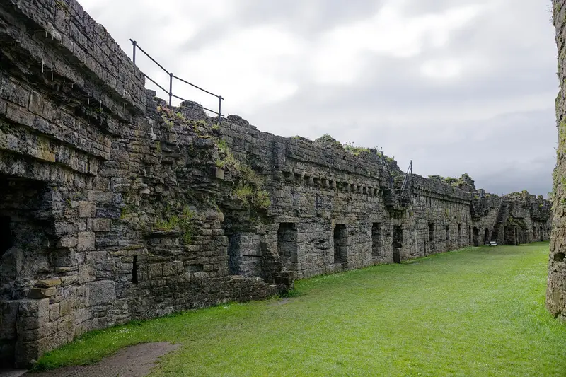 Beaumaris Castle: Beaumaris: Beaumaris Castle, east outer curtain wall, seen from the North