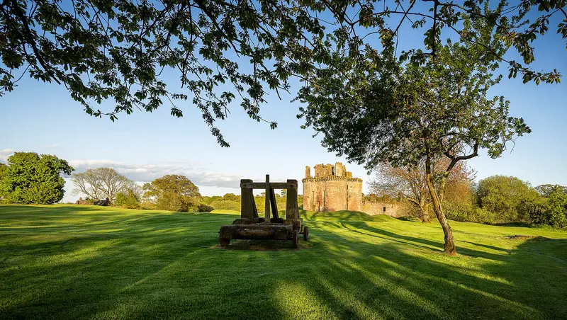 Caerlaverock Castle: Caerlaverock Castle is a moated triangular castle first built in the 13th century. It is located on the southern coast of Scotland, 11 kilometres south of Dumf