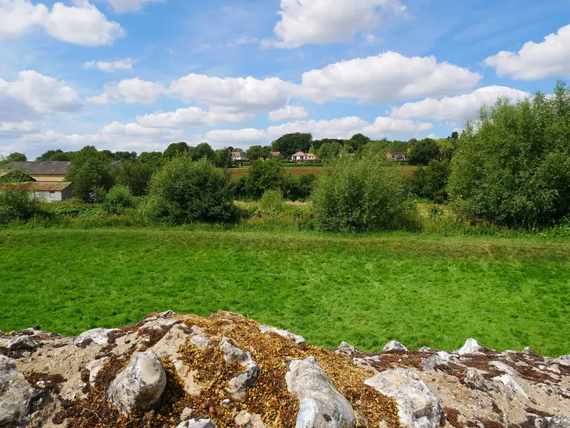 Eynsford Castle: A view west, facing across the River Darent, from Eynsford Castle in Kent.