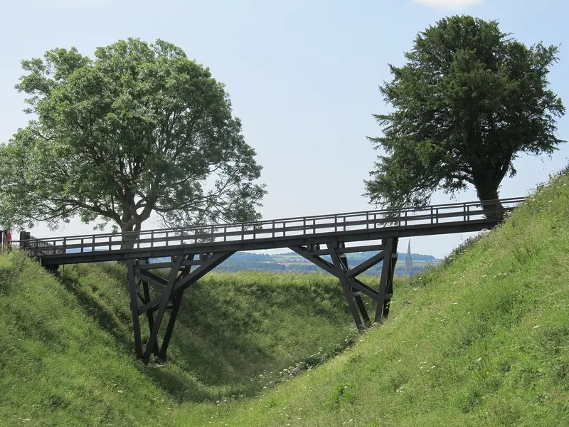 Old Sarum: Footbridge to the entrance to Old Sarum, near Salisbury, UK.