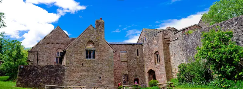 St Briavels Castle: St Briavels Castle is a moated Norman castle at St Briavels in the English county of Gloucestershire. The castle is noted for its huge Edwardian gatehouse that 
