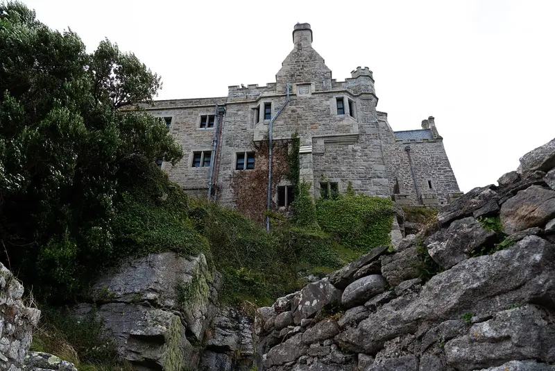 St Michael's Mount: Castle of St Michael's Mount viewed from footpath below