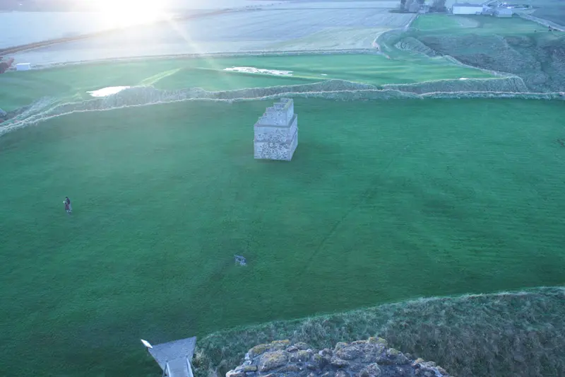 Tantallon Castle: view of earthworks from the ramparts at Tantallon (at sunset)