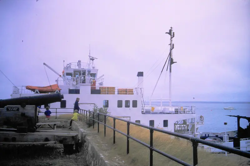 Yarmouth Castle: A ferry alongside Yarmouth Castle
